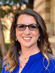 Picture of Karen Hedges smiling in a blue blouse.