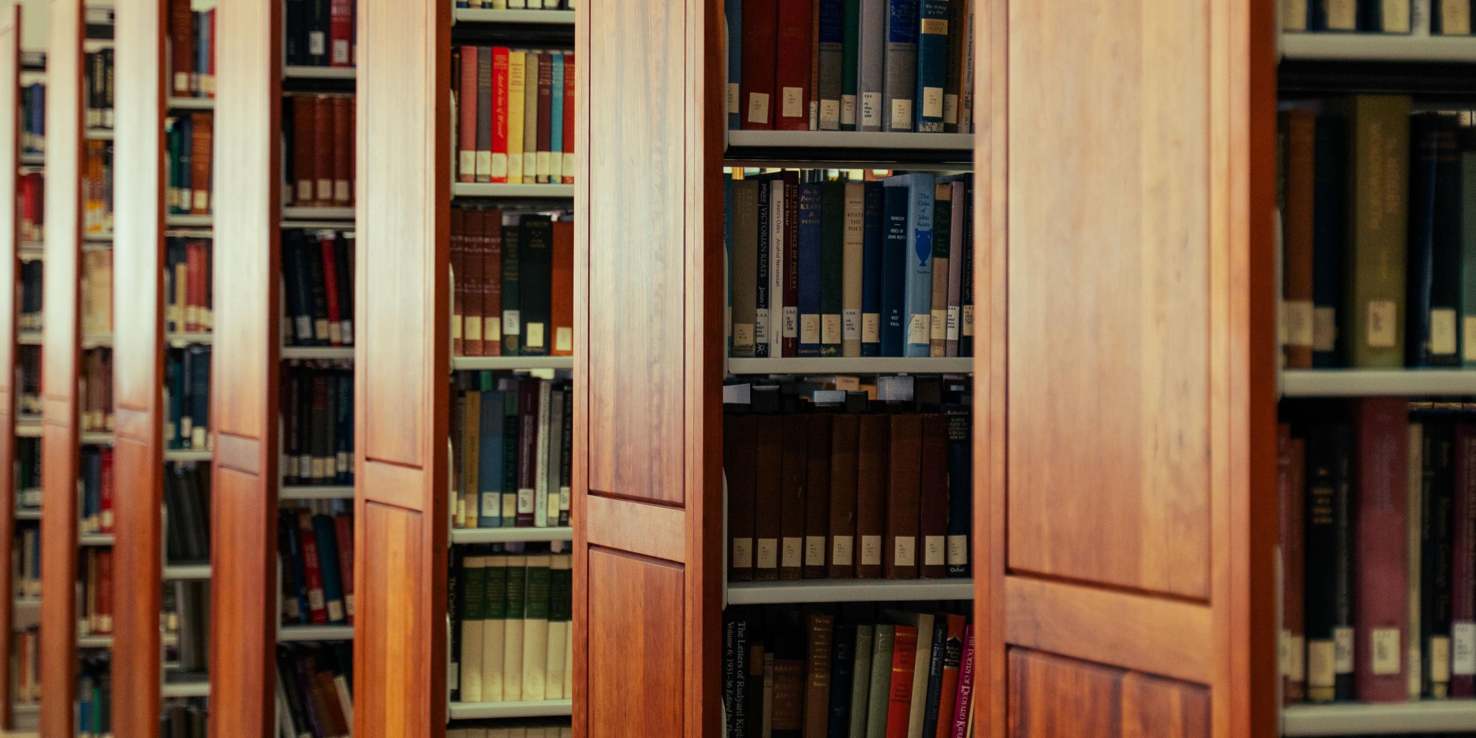 Libary with aisles of shelves full of books